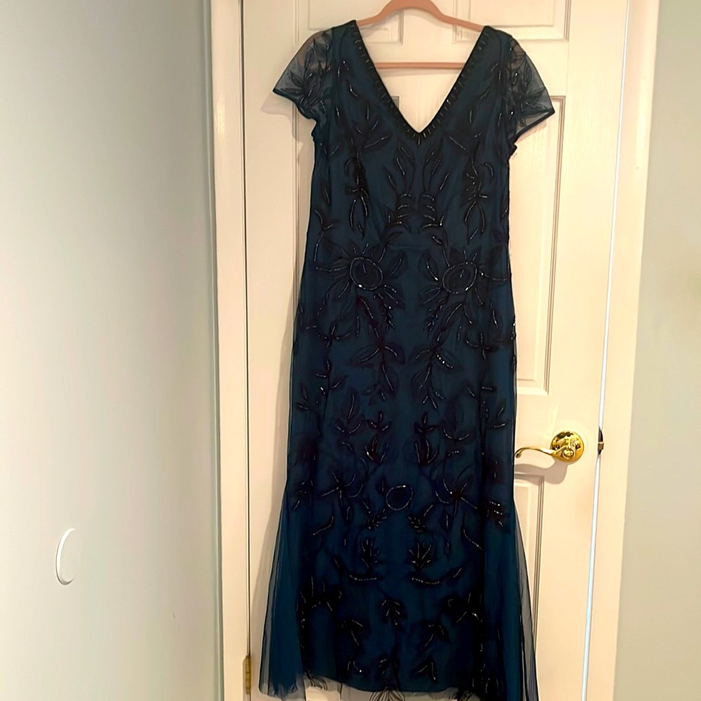 Beautiful beaded evening gown. teal with black beading